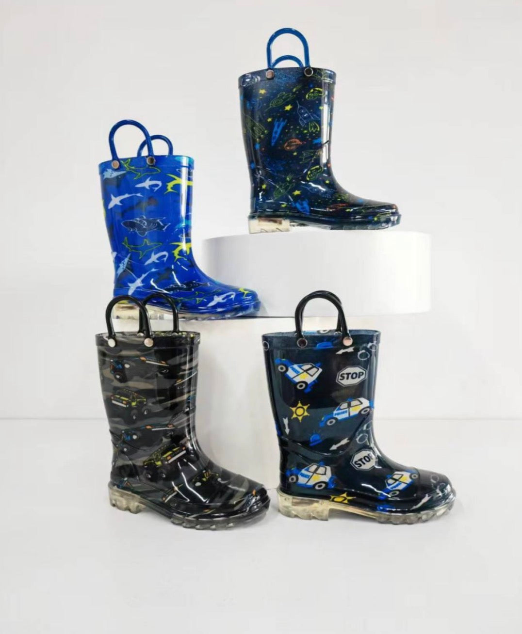 310203/06 - $195 por par (Caja con 10 pares por color) Botas de lluvia para niños de PVC